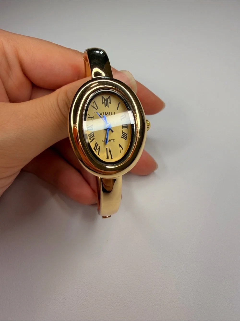 Elegant Gold-Tone Stainless Steel Bangle Watch - Picture 12 of 15